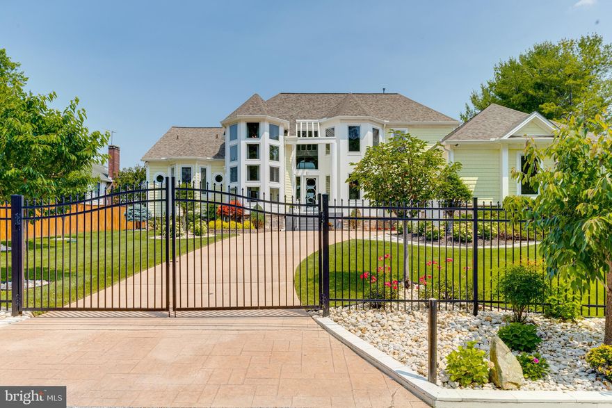 This One-of-a-Kind Waterfront Checks All the Boxes!

Welcome to a truly exceptional waterfront retreat with direct Middle River frontage! Perfectly sited at the end of a quiet dead-end street, this custom-designed home offers rare privacy, unmatched water views, and luxury features throughout. Nestled on a double lot backing to woods with no flood insurance required, this property is an incredible combination of serenity and function.

Step inside to soaring ceilings and a dramatic two-story living room that showcases the expansive panoramic water views. The main-level waterside primary suite is a dream, featuring a gas fireplace, private deck access, and a tranquil spa-like setting.

Enjoy resort-style outdoor living with professionally landscaped grounds, an automatic irrigation system, a pier with boat lift, and three jet ski lifts—everything you need to live the waterfront lifestyle to the fullest. The attached 3+ car garage and ample parking make entertaining effortless.

Additional highlights include a screened porch with retractable walls, a home gym, and a full home theater with tiered leather seating—ideal for year-round enjoyment.

This rare offering must be seen in person to be truly appreciated. Schedule your private showing today and experience the best of waterfront living on Middle River.