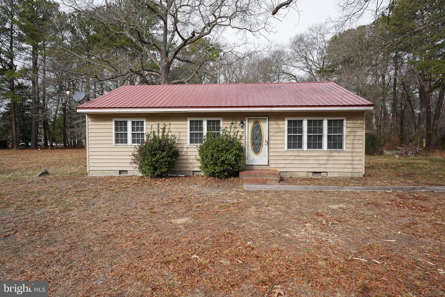 Turn-key adorable and affordable 3BR rancher w/new HVAC, new luxury-vinyl plank flooring throughout, new kitchen, new fixtures, fresh paint throughout, new washer/dryer combo, NEW septic. Nice-sized lot facing forested acreage, yet less than a mile to Rt 13, less than 2 miles to Fruitland's big-box store shopping/dining hub - or 4 miles to more unique shopping, dining, and events in Downtown Salisbury. This home has been transformed, and is ready for you! Bright and breezy living room with triple windows for tons of sunlight, LVP floors, and a new ceiling fan. Dreamy kitchen is new, new, new - new cabinetry, new granite counters, new stainless steel appliances and fixtures. 3 bedrooms with new ceiling fans, new paint, new LVP floors. Full bathroom w/tub/shower combo, new vanity and fixtures, LVP flooring. Utility room w/new LVP flooring leads out to the spacious rear yard. Call today to call this charming house your new home! Sizes, taxes are approximate.  *Note - although the forested acreage across the street is not currently built on, and has been wooded land for decades - of course the seller, nor the listing agent cannot guarantee there will never be a home there sometime in the future*
