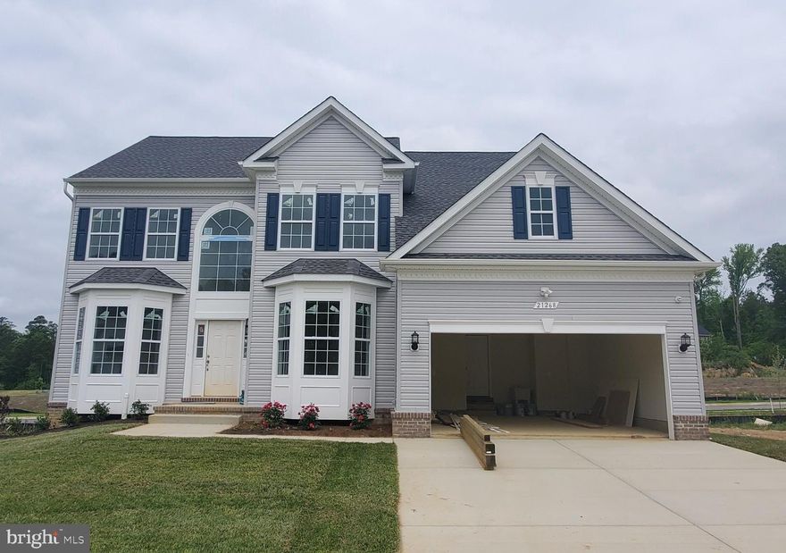 Sold & Settled  Breton #1 at Elizabeth Hills. This home features a fully finished basement with a rec room, full bath and 2 rooms that could be used for lower level bedrooms. Main level also features full bath and guest suite area, along with family room, kitchen, dining room w. bay window and living room w. bay window; with landing off of 1st floor kitchen to backyard.  2nd floor will have an additional 4 bedrooms and 2 full baths, along with a walk in laundry room w. workstation.  Cosmetic upgrades such as quartz kitchen countertops, surround sound system, vinyl plank flooring, ceramic wall tile, etc..Home on a private lane site