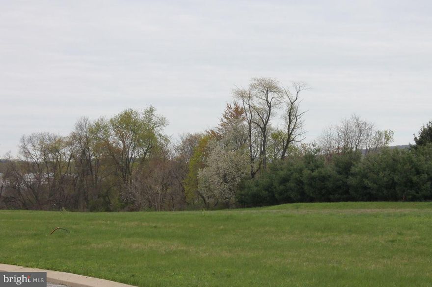 Beautiful level lots with public utilities in scenic countryside-Build your dream home-choose from builders plans or bring your own. Lots available for exposed basements.