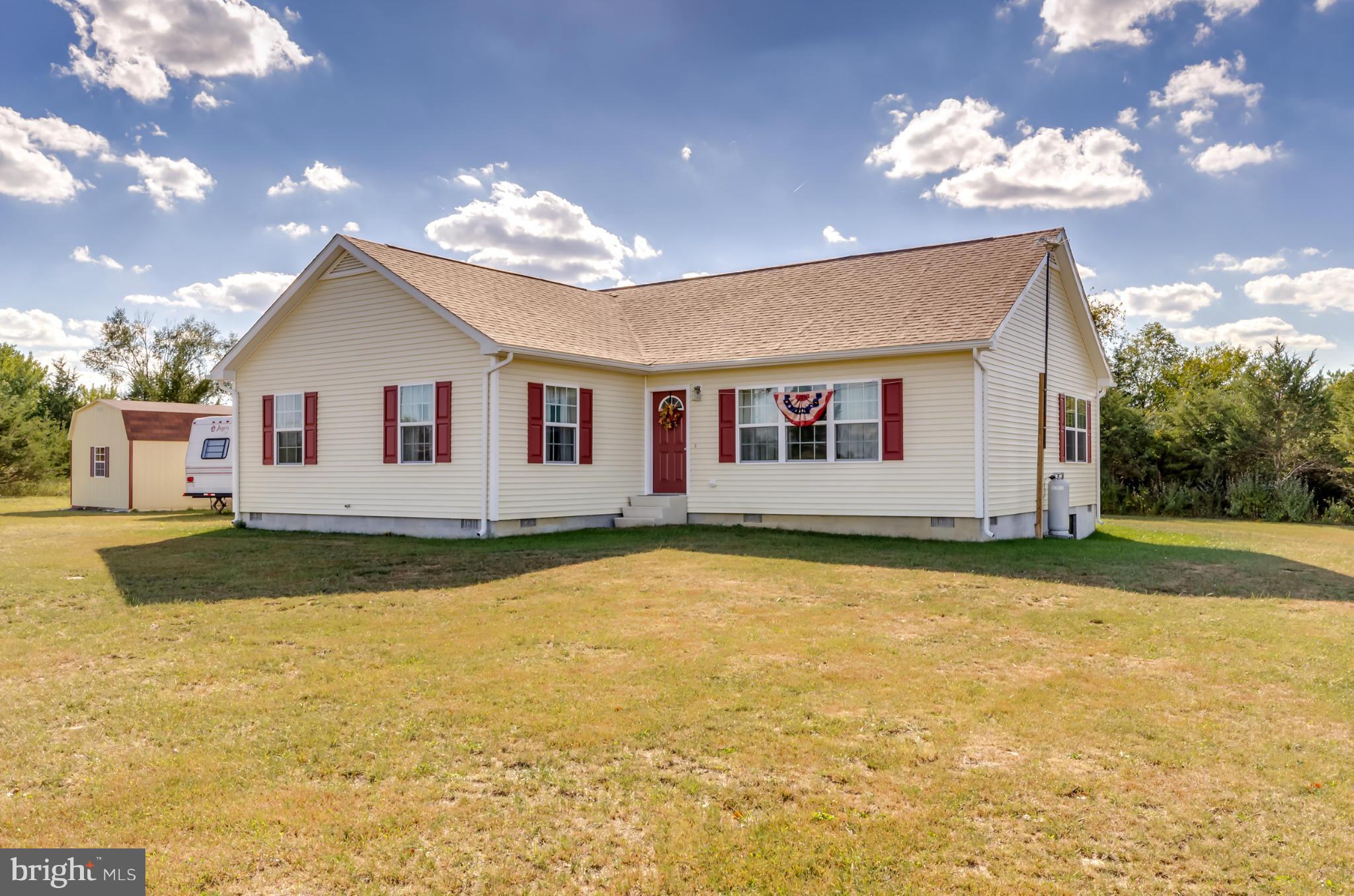 One acre unrestricted rancher in country setting built in 2015 boasts over 1,600 sq ft w/ 48x24 floored attic for extra storage. Home features crown molding throughout, ceramic tile, laminate hardwood floors, gas fireplace, Rain soft water systems, lg master bedroom w/ lg master bath, dual sinks, sep shower w/ soaking tub and much more! Outside storage shed/workshop conveys. Close to Winchester