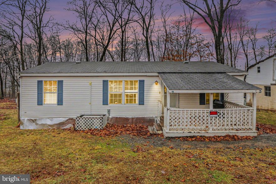 PERFECT SETTING ON ALMOST AN ACRE — BACKS TO THE WOODS!
Cute as a button 3-bedroom, 2-bath ranch nestled on 0.71 acres of peaceful, private ground in Perry County. This charming single-story home features an open floor plan with a country kitchen, dining area, and spacious living room — all flowing together beautifully for easy everyday living.
The owner's suite includes a walk-in closet and private bath. Two additional bedrooms each offer walk-in closets. Enjoy laminate flooring throughout most of the home for easy maintenance.
Step outside to a back deck perfect for BBQs, a welcoming front porch, and a secluded rear yard backing up to mature trees and mountain views. The oversized detached 2-car garage provides abundant parking and storage space.
Additional highlights include: 200+ amp electric service, oil heat, private well & septic, double-pane windows, and main-floor laundry.
Whether you're relaxing on the porch, entertaining inside, or tackling projects in the garage — this is home!