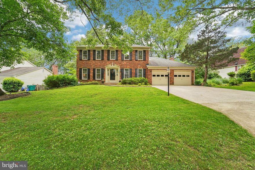 Welcome to this well-maintained Colonial-style detached home, featuring a classic brick front and situated in a desirable Silver Spring location. This spacious residence offers four bedrooms, two full bathrooms, and one-half bathroom. Interior highlights include a mix of hardwood, carpet, and ceramic tile flooring, along with a cozy propane fireplace that enhances the main living space. The home includes a partially finished basement, providing additional versatility for recreation, storage, or home office use. Don’t miss this opportunity to own a charming and functional home with timeless appeal.