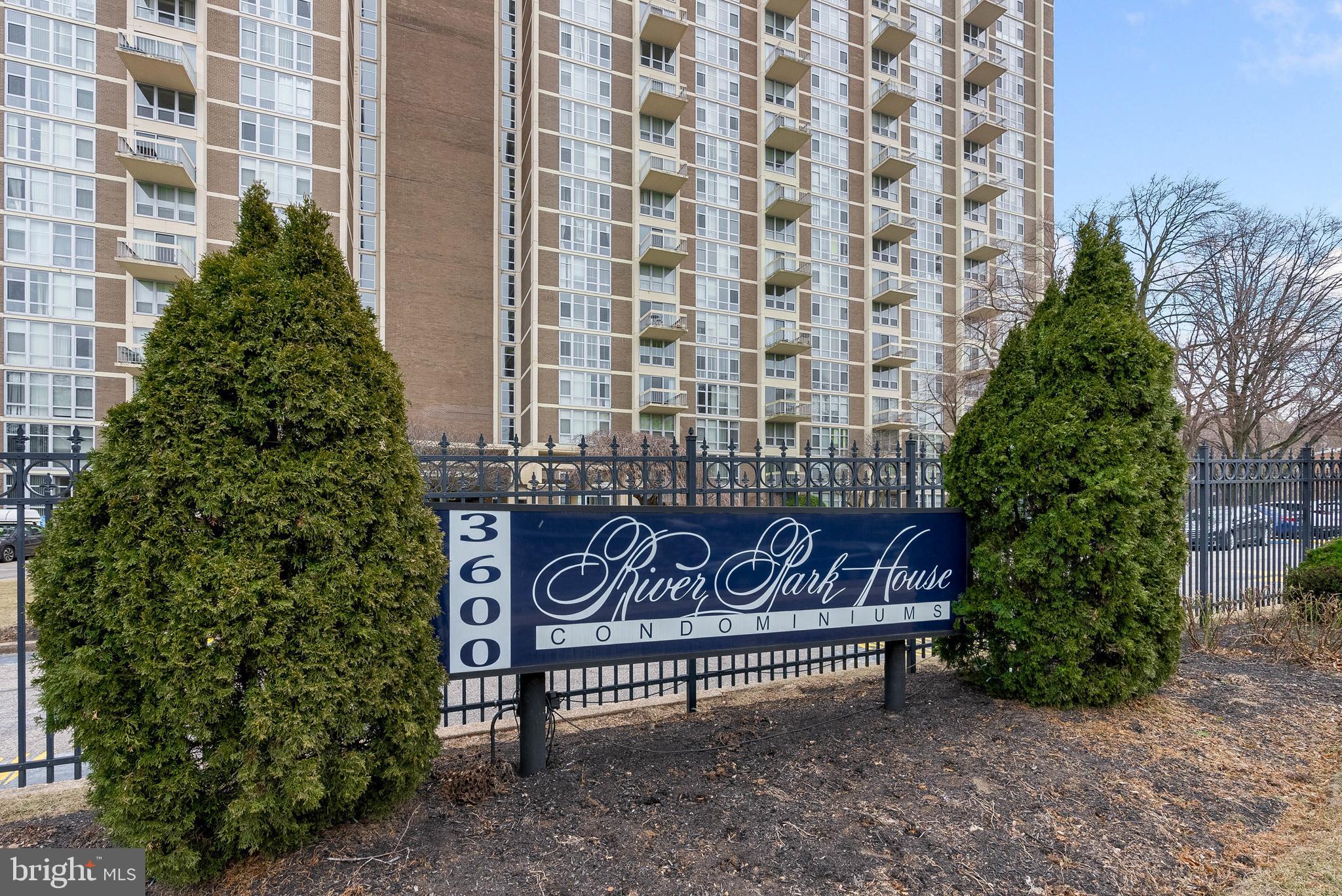 Serene tree-top views, a well-kept building with lots of amenities, and a convenient location set against sprawling Fairmount Park, just off City Ave, combine for easy living at River Park House Condominiums. Unit #905 is a large, updated corner condo with 3 bedrooms, 2 full bathrooms, a new kitchen, in-unit laundry, and central a/c. Sought-after building amenities include a welcome desk staffed 24/7, on-site management and maintenance, a gym, a library, and an event space. Covered parking and pool access are also available for a fee. This unit's layout features an expansive living room at its center with a picturesque wall of windows that creates an open and airy feel. Modern floors stretch into the separate dining area, where stunning views are always on the menu, and into a brand-new kitchen fitted with plenty of shaker cabinetry, stainless steel appliances, including a dishwasher and gas range, granite counters, and a subway tile backsplash. On one side of the unit is the spacious primary suite with an attached full bathroom and laundry. Two more bedrooms and a second full bathroom are on the other side. All have floor-to-ceiling windows and generous closet space. In addition to everything inside, this fantastic location is close to popular shopping centers with stores and restaurants, like Target, Fresher Grocer, Chick-fil-A, Honey Grow, and Olive Garden. Extensive walking trails are steps away, plus there's easy access to public transit, I-76, Rt-1, and Lincoln Drive. Schedule your tour today!