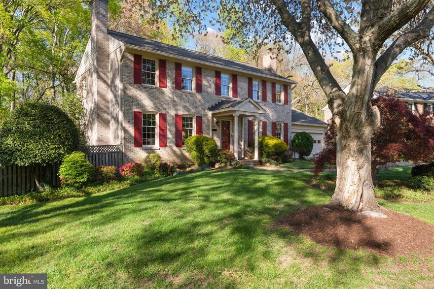 Welcome to 1910 Toll Bridge Ct in Alexandria, VA. This stunning brick Colonial is a spacious single-family residence that combines classic charm with contemporary amenities, offering the perfect setting for relaxation and entertainment. With four (could easily be five if needed) generously sized bedrooms, two full bathrooms, two half bathrooms, and a two car garage, this home is designed to accommodate your family with style and ease.
As you step inside, you’re greeted by a grand foyer that sets the tone for the home. The main level boasts large windows throughout, allowing natural light to pour into every room and create a warm, inviting atmosphere. The front living room, highlighted by a cozy gas fireplace, provides a perfect space for both relaxing and entertaining. Adjacent to the living room, the spacious dining room features large windows that bathe the space in light and provide the perfect backdrop for family meals or dinner parties.
At the heart of the home is the kitchen, complete with rich wooden cabinetry, stone countertops, and a pantry for extra storage. The kitchen opens on one end to the dining room, and on the other side to a breakfast room that is adjacent to the living room, creating a seamless flow between cooking, dining, and relaxation. This space is perfect for everyday meals or special occasions. 
Upstairs, the large primary bedroom is a true retreat, featuring a spacious sitting area that can be used for reading, relaxation, or as a private nook to unwind after a busy day. The primary suite is a peaceful haven, perfect for unwinding at the end of the day.
The walk-out lower-level rec room features a large fireplace and a wet bar, providing an ideal space for hosting guests or enjoying a quiet night in. It also has a flexible bonus room that can serve as an office, gym, or whatever suits your needs.  A storage room helps you keep things organized and accessible. 
Step outside to discover an expansive deck that extends your living space into the outdoors. Whether you're sipping morning coffee, hosting evening gatherings, or simply enjoying the fresh air, this outdoor oasis is an ideal spot for relaxation and entertainment. Lovely landscaping all around the home, including a grove of hostas in the rear and beautiful koi pond with a waterfall (just add koi!), add an extra touch of tranquility to the backyard.  With no neighbors at the rear of the house, this is the perfect place to unwind and enjoy the fine weather.