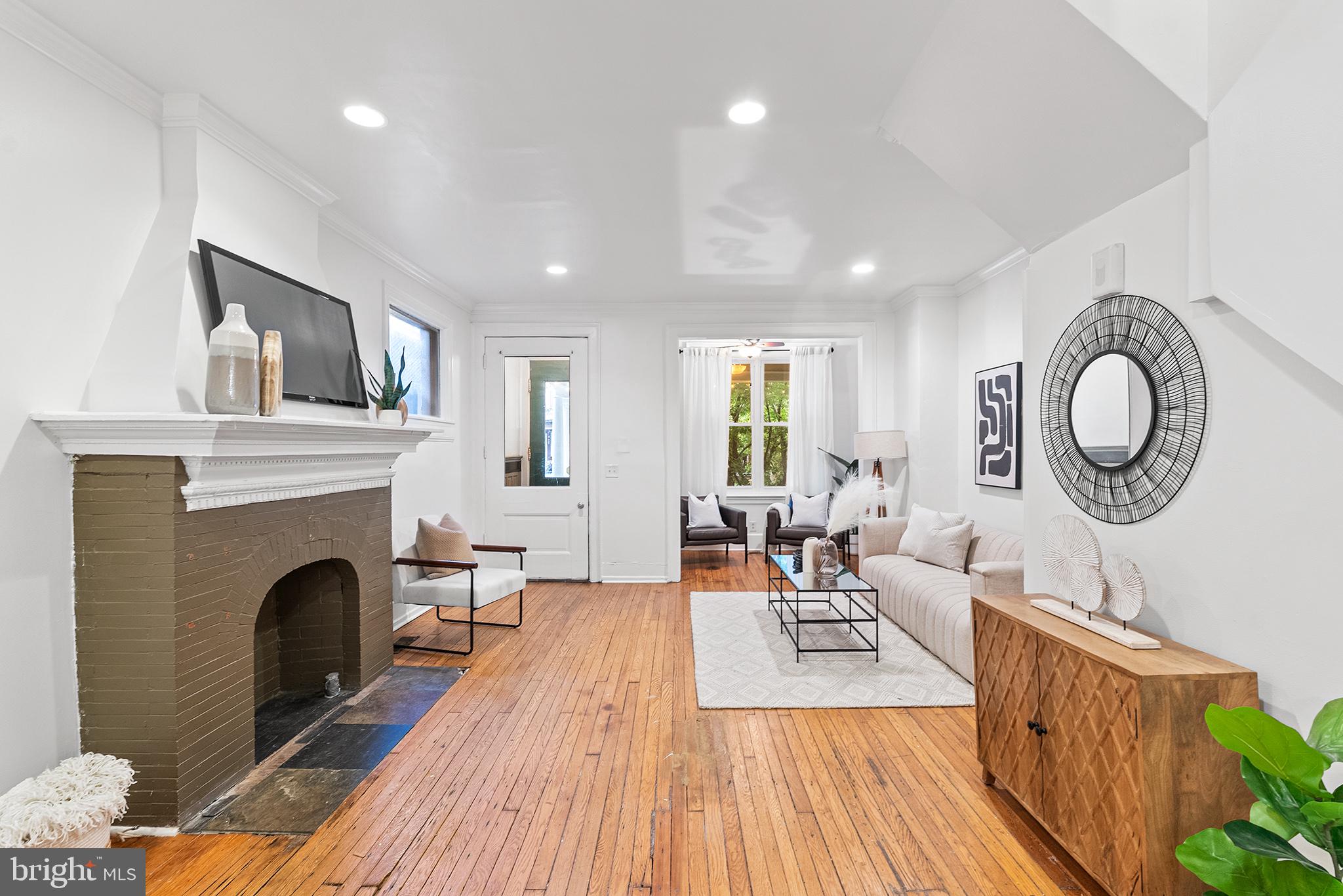 Priced to sell, this lovely three-story Cedar Park Victorian twin in West Philly is ready for new owners! With five large bedrooms and over 2,500 square feet of interior living space, you’ll have room for whatever configuration you need. Need room for a large family? Absolutely. Dreaming of a dedicated home office or a private workout studio? No problem—or a combination of all of them. Walk past the large (and recently repoured) concrete porch and into the generous living room with a decorative fireplace and a window nook perfect for your cozy reading chair or play area. The dining room seats eight easily, and past that is the kitchen with granite countertops, counter seating, stainless steel appliances (including dishwasher), and ample room for multiple simultaneous chefs. You can find a convenient mudroom and a powder room behind the kitchen, with a glass door leading to the lush backyard. Take your choice of staircases up to the second floor with two sizable bedrooms, a massive full bathroom with a separate shower and Jacuzzi tub, and an upstairs laundry room. The carpeted third floor has three additional bedrooms and another full bath. There’s plenty of storage in the unfinished basement (especially since your laundry is upstairs), or finish it for even more usable space. The home has central air, a new water heater, and other updates for peace of mind, plus easy travel to Drexel, UPenn, the University of the Sciences, University City, Malcolm X Park, Clark Park, public transit, and all the benefits of Baltimore Avenue and West Philly. This is the one!