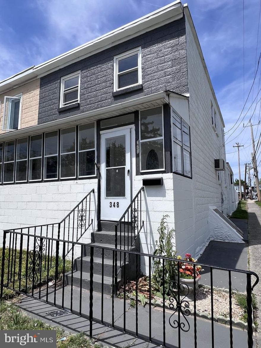 Welcome to 348 Massasoit Street, a beautifully remodeled gem nestled in the heart of Essington. This fully updated home blends modern style with classic charm, featuring brand-new finishes throughout, including sleek new flooring, a brand new contemporary white kitchen with stainless steel appliances, and a large fully remodeled bathroom with designer tile and touches.  All lighting in the house has been updated with modern fixtures and recess lighting has also been added.  A brand new washer and brand new dryer are located in the basement, along with a convenient utility sink.  The heater and water heater are also new.  The large backyard is fully fenced in with a beautiful green grass lawn.  The backyard also features a large patio and large covered porch. Every detail has been thoughtfully upgraded, offering move-in-ready convenience and peace of mind. Located just minutes from the airport, major highways, and waterfront parks, this home offers both comfort and convenience—perfect for commuters or anyone looking for a turnkey property in a quiet, walkable neighborhood. Don’t miss this opportunity to own a stunning home with nothing left to do but unpack!