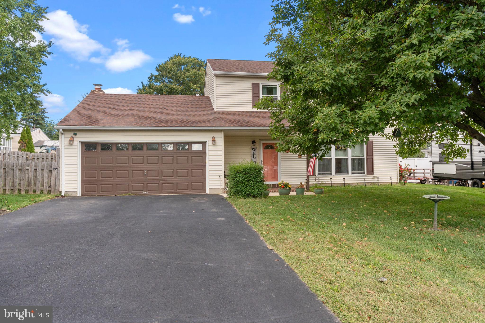 Welcome home! Step inside this beautifully updated 4-bedroom, 2.5 bath home that perfectly blends charm and modern living. The heart of the home features an upgraded kitchen and a cozy gas fireplace, while the spacious primary features a beautifully updated bath. Enjoy gatherings in the large backyard, designed for outdoor entertaining and relaxation. Additional highlights include excellent curb appeal, an attached 2-car garage, and a prime location close to shopping, dining and major commuter routes.
