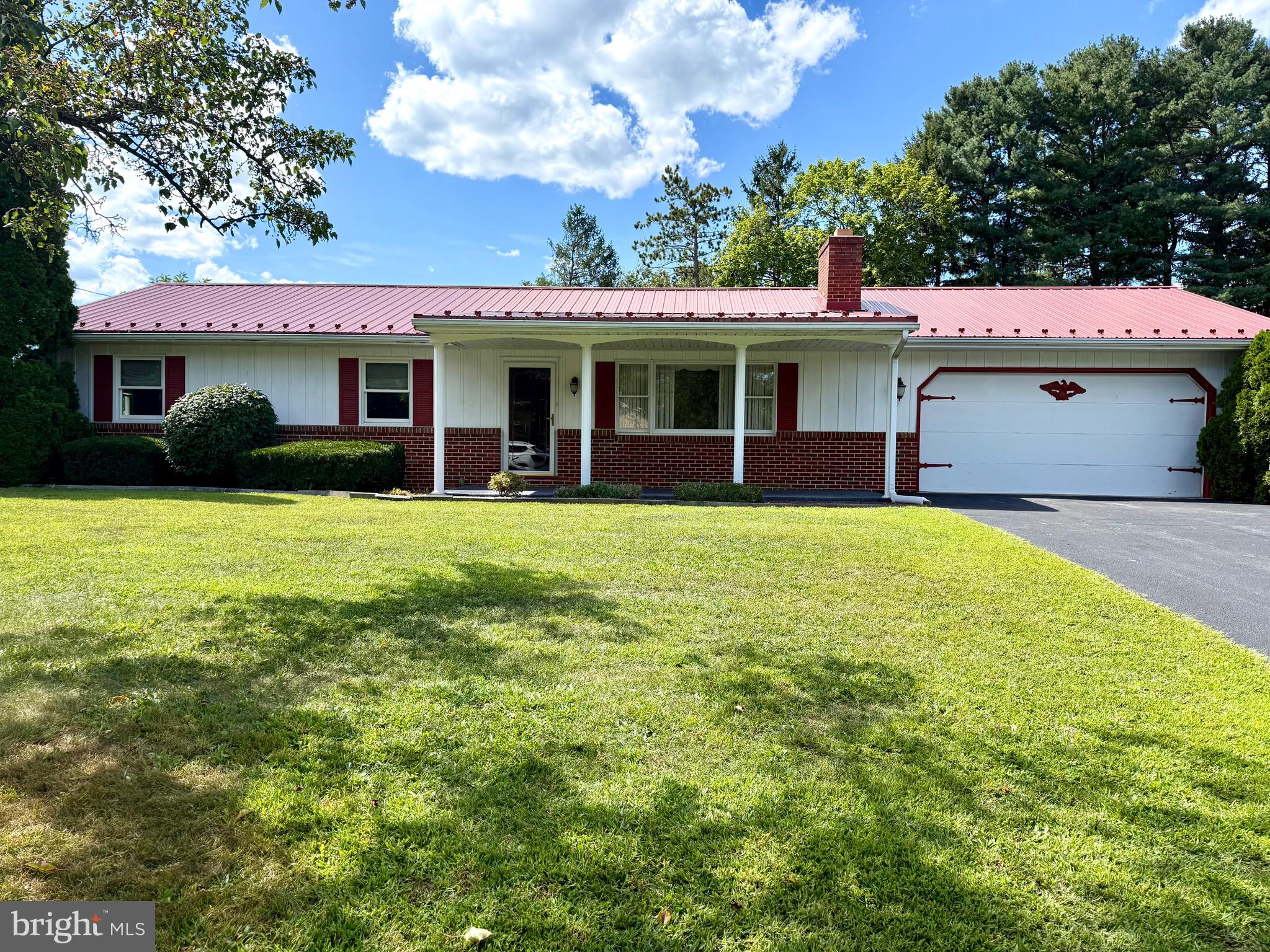 A true gem tucked back in an adorable country setting, this home is well built and has been well maintained. With the major items taken care of, all you have to do is add your own personal touch. Newer metal roof- CHECK. Newer water heater- CHECK. Updated kitchen with beautiful, granite countertops, a sexy backsplash that compliments it, and brand new, top of the line stainless steel appliances- CHECK! New flooring in kitchen, dining, hall and main bath- CHECK! New tub/shower in main bath, totally redone en-suite bath- CHECK and CHECK! A nice sized Florida room right off of your dining space, is complete with AC and heating so you can enjoy it all year round. This lovely home is situated on a nice, flat, .49 acres. A covered porch out front and a nice covered porch off your sun room are always a desirable features. A large 2 car garage, nice storage shed out back and full unfinished basement complete the package. Prepare to fall in love as you walk through the front door and envision yourself in your new home.
A BONUS FEATURE WITH THIS HOME- you have water rights to the pond, just down at the end of your street.