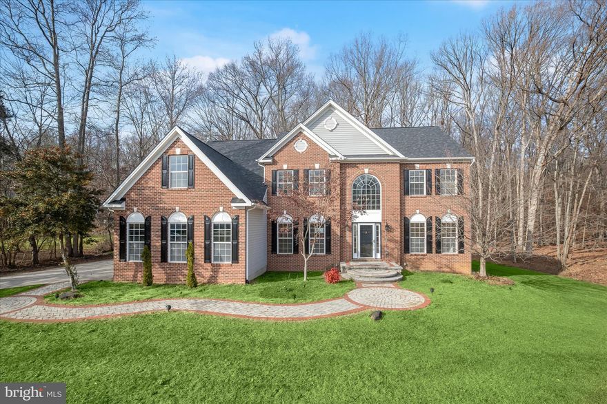 Welcome to 51 Fearless Ct, an amazing single-family home nestled in the serene and historic town of Havre De Grace.  This completely renovated and exquisite residence redefines luxury living. Spanning an impressive 6,000+ total square feet, this architectural masterpiece, constructed in 2005 with enduring brick elegance, offers a harmonious blend of sophistication and comfort. Step inside to discover a grand foyer that sets the tone. Gleaming hardwood floors leads you to all areas of the home. The gourmet kitchen is a culinary enthusiast's dream, equipped with top-of-the-line appliances, new quartz top island, new white cabinetry, new floors and ample space for culinary creations, seamlessly flowing into elegant sunroom and living areas that invite gatherings and celebrations. Enjoy the tranquil views of the beautiful backyard from the eat in kitchen that opens to the family room bathed in natural light by the surrounding windows. The two-story family room ensures convenience but the stunning fireplace is perfect for cozy evenings and entertaining guests in style. A large patio for entertainment, cookouts, or just relaxing is just off the family room and eat-in kitchen. The laundry room, a brand new half bathroom and a 3 car garage completed the first floor. Upstairs boasts a primary suite with its own new bathroom and 3 additional generous sized bedrooms with an additional completely renovated bathroom. For additional living space, the basement can provide just that - bring your imagination and finish the basement to your personal needs. Set on over half an acre, the outdoor space is a private oasis, ideal for serene relaxation or grand outdoor events. The attached three-car garage and generous driveway provide ample parking for guests, enhancing the ease of entertaining. This property is not just a home; it is a lifestyle, offering unparalleled luxury and exclusivity in a tranquil setting. Great commuter location, close to major routes, shopping, restaurants, parks, schools, even a golf course across the way!