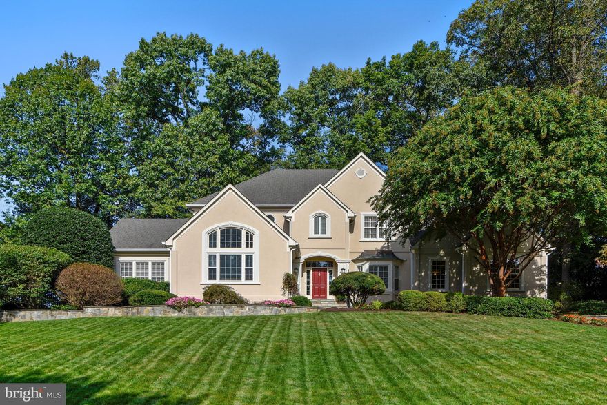 This luxury estate home is perfectly situated on a premium lot to provide stunning outdoor living space. The newly remodeled kitchen is a chef's dream with granite counter-tops, recessed lights, double wall oven with LCD display, walk-in pantry & center island with prep sink & 5-burner gas cook-top. The kitchen is surrounded by windows overlooking the outdoor living space including a large, fenced-in yard. The kitchen opens to the family room with recessed lights & fireplace with "floating" stone hearth. The kitchen & family room are joined by a two story ceiling with French doors leading to the deck. Just off the family room is an adorable, light-filled play room with fresh paint & new carpet. The screen porch will "Wow" you with its master craftsmanship & fine woods. Upstairs you will find the spacious master bedroom suite with his & hers walk-in closets, vaulted ceiling & luxury master bath with brand new granite vanity top. The upper level includes 3 additional bedrooms all with en suite baths & custom closets. The spacious recreation room features a brick fireplace & walk-up stairs to the slate patio. The lower level also includes an exercise room, a 5th full bath and an expansive storage area. This estate home also includes a 3-car attached garage & beautiful landscaping accented by stone walk ways, patios & retaining walls. Welcome home.