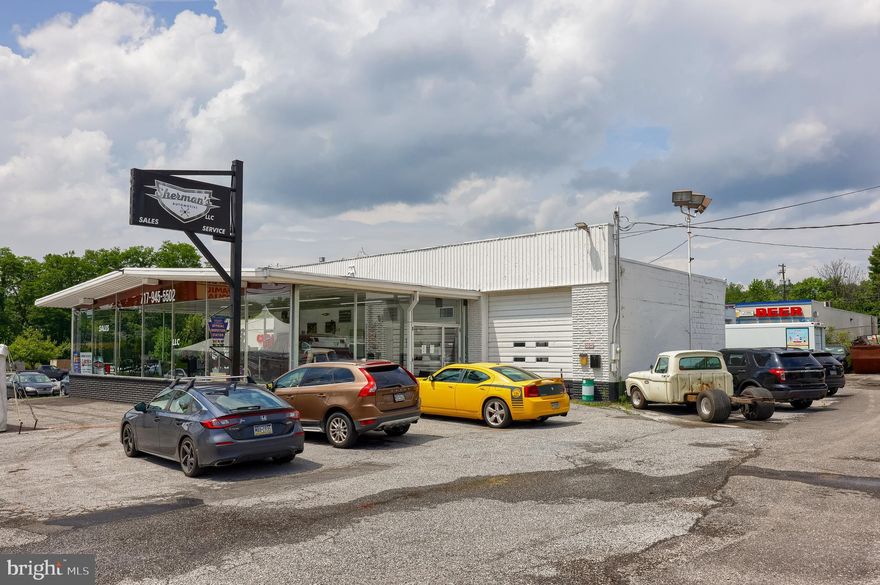 Freestanding garage/commercial building located within the main retail corridor of Elizabethtown and minutes from Route 283.  The showroom area is comprised of 1,300+/- SF and the remaining +/- 4,452 SF is a service garage including four (4) vehicle lifts and four (4) 12’x12’ drive-in doors.