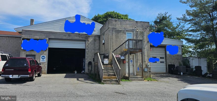 2.11 acre lot with 5500 sq ft building currently leased on month-to-month basis to 4 different tenants with $4900.00 gross monthly income. Agricultural zoning with allowed long term non-conforming commercial/industrial usage (towing company storage, body shop, mechanic shop and office space). Sold as is, buyer to negotiate new leases with existing tenants if desired. Well is on this lot but is shared with Ace hardware. New septic tank and drain field in 2021. Body shop portion of the building has HVAC system.