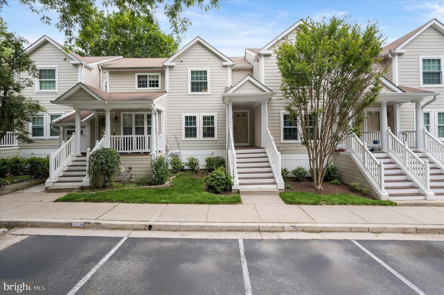 Nestled within the sought-after Dorsey Hall community of Ellicott City, this desirable neighborhood is known for its mature tree-lined streets, scenic walking and jogging paths, and the everyday convenience of nearby shopping, dining, and entertainment.  Step inside to the main level living area, where luxury vinyl flooring is complemented by refined picture molding, chair railing, and elegant box wainscoting, creating a warm yet sophisticated atmosphere. The gourmet kitchen is thoughtfully designed with Quartz countertops, a center island, soft-close cabinetry, stainless steel refrigerator and dishwasher, and a custom tile backsplash. A charming breakfast area features a custom-built-in banquet and provides direct access to the spacious deck, an ideal setting to enjoy peaceful views of the surrounding natural landscape.  Upstairs, the primary bedroom suite offers plush carpeting, a generous closet, and a striking coffered accent wall. The en-suite bath is appointed with ceramic tile and a shower/tub combination. Two additional bedrooms and a well-appointed hall bath complete the upper level.  Perfectly positioned for both relaxation and accessibility, this home offers easy access to major commuter routes, including I-95, US-29, and MD-32. Enjoy proximity to Merriweather Post Pavilion, The Mall in Columbia, and Centennial Park, providing endless options for dining, shopping, and outdoor recreation.