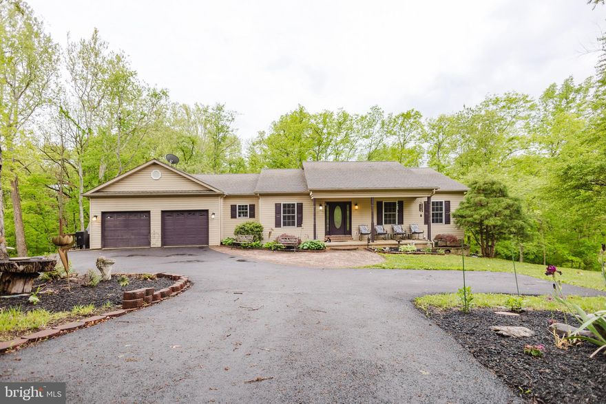 Set on 5 peaceful, no-HOA acres, this well-appointed 4 bed, 4 bath home offers nearly 2,200 sq ft above grade with a partially finished basement for added versatility. Enjoy an attached 2-car garage plus a detached RV garage—perfect for extra vehicles, equipment, or hobbies. Step outside to a private backyard retreat with a spacious deck and a greenhouse ready for year-round gardening. Conveniently located just minutes from I-81 and a short drive to historic Shepherdstown, this property offers the ideal blend of privacy, space, and accessibility—without sacrificing comfort or convenience.