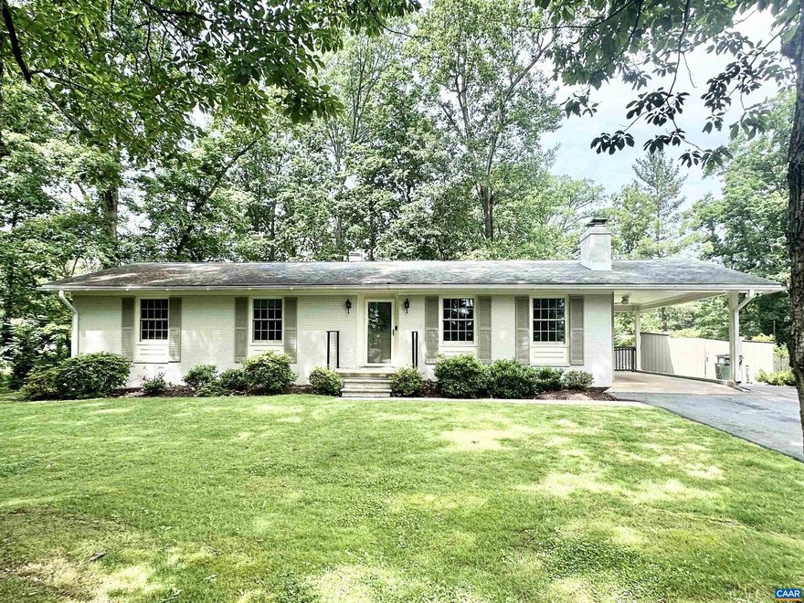 Entered for comp purposes - sold pre-market. Updated ranch style home on an unbelievable nearly level lot just a stone's throw from Barracks Rd Shopping Center. Sellers added additional flex room in basement and a full bath to add to the existing family room.,Painted Cabinets,White Cabinets,Fireplace in Basement,Fireplace in Living Room