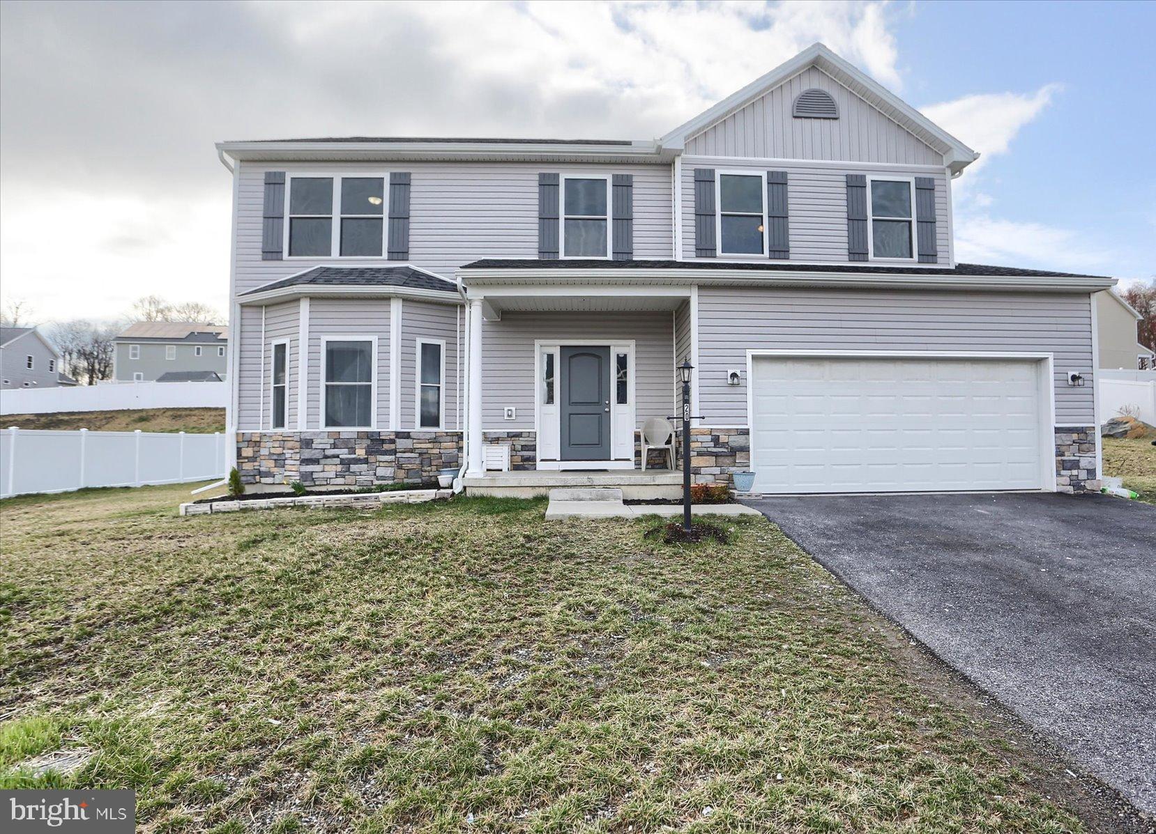 This beautifully crafted Richmond Model, built in 2023, sits on a spacious 0.35-acre lot and offers 4 large bedrooms and 3 full bathrooms, including one on the main floor. The home features a modern kitchen with quality cabinetry, granite countertops, a large island, stainless steel appliances, and luxury vinyl plank flooring. The owner's suite includes a spa-like bath with a 4x6 tile shower and elegant tile flooring. A 9-foot basement ceiling offers great potential for additional living space. Just 4 minutes from I-83, this move-in-ready home combines comfort, style, and convenience.