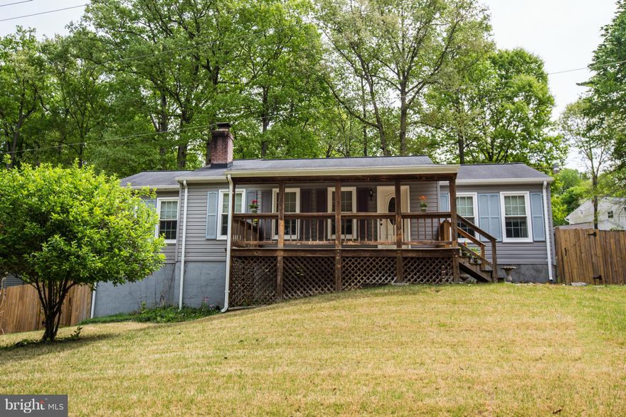 Spacious updated rambler with open floor plan, split bedroom design, brick FP, large front porch, enclosed back porch, fenced backyard, large shed with electric, bigger than it looks, basement has bonus rooms, rec room, family room, 4th BR (NTC), possible in-law suite, updated bathrooms, updated flooring, home is well maintained, so close to shopping, dining, I-95. No HOA. One year home warranty.