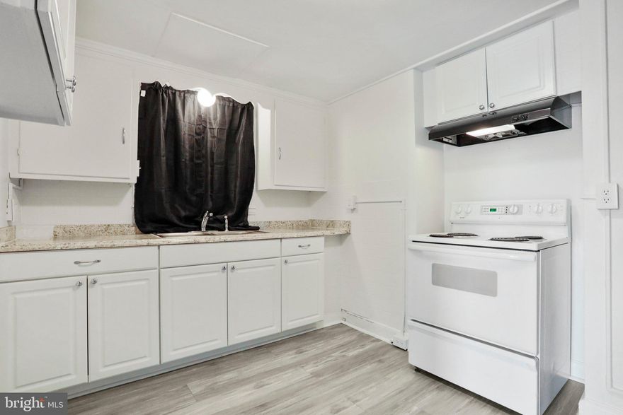 Call this lovely unit home! Walk in to an oversized foyer that leads to a large family room- dining room combination. The two bedrooms are both good sizes  with ample closet space. The unit features a bathroom with new vanity and light fixture. There is plenty of  off street parking behind the building. Call property manager with any questions!Tenant pays electric, owner pays water, trash, sewer. Showings require credit score of 650 or better, a year employment history, income must be twice the monthly rent. No previous failure to pay, warrant of restitution, or evictions.