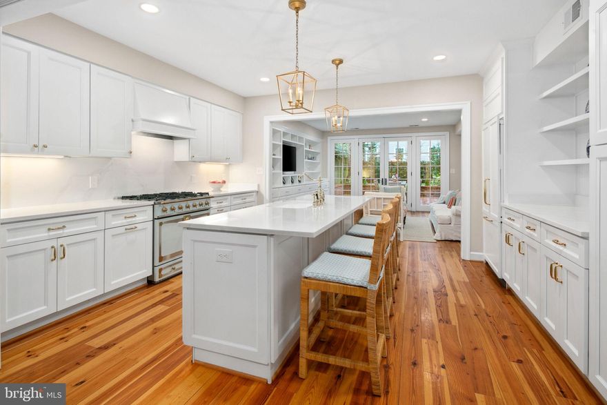 Incredibly rare opportunity for an incomparable home situated on one of Old Town's most picturesque and sought after blocks. This custom home features a stunning addition completed in 2020 to intentionally preserve the character of 1880, when the home was originally built, while seamlessly tripling the home's size with today's conveniences. The addition was thoughtfully designed and constructed by one of Old Town's premier local builders and preservationists, Bill Cromley. Unique floor plan featuring 4 bedrooms and 3 full baths on upper level including two ensuite bedrooms. Bright and open main level ideal for those looking for fewer levels and stairs than the typical Old Town home. From the front entrance you are welcomed by the living room with original fireplace and built-ins. Once through the living room the addition offers open living between dining, kitchen and family room with wall of glass and French doors overlooking 15ft x 15ft brick patio and sizable back yard. Two separate entries add to the convenience including gated side alley with covered entry door and only one step inside! The home also features: 2 wood burning fireplaces, wide plank heart pine flooring throughout, original trim detail, custom elegant white Kitchen with statement "Tapestry Blue" La Cornue gas range as its centerpiece, custom built ins including mudroom "locker area" off side entry, custom lighting, primary suite with walk in closet, double vanity and beautiful curbless marble shower. Secondary suite has 2 large closets, original fireplace, built ins/desk area, and private full bath. Hall bath has period correct claw foot tub, beadboard trim, and marble floor. Dual zone HVAC(both units 2019). Incredibly convenient to everything Old Town has to offer! Down the street from Windmill Hill Park, Jones Point Park, GW Parkway path, King St, 5 miles to DCA airport, and only 7 miles to DC.