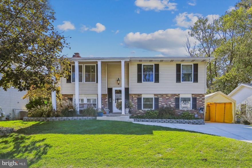 The manicured lawn and exceptional curb appeal only hint at  what awaits you in this fantastic Four Seasons Estates home. As you enter the front door you'll immediately note the design accents and attention to detail, which prevail throughout. On the upper level you're met with an open concept that includes a generous living/dining area and gorgeous kitchen. The kitchen offers a large island with ample seating, gleaming stainless steel appliances, and quartz countertops set against a glistening glass tile backsplash. There are also three bedrooms and a full bath on this level. On the lower level you will find a den/family room offering plantation shutters, shiplap, a contemporary in-wall electric fireplace, and plenty of seating area for guests. The spacious primary bedroom is also on this level, along with a full bath and separate laundry room. Enjoy the changing seasons in your screened porch with two ceiling fans, radiant heater, and TV. The low maintenance, composite deck above is inviting and offers an aluminum gazebo covering the grilling area for cookouts, rain or shine! Fully fenced rear yard. Many newer items include an architectural roof (2015), Gas Furnace (2020), A/C (2010), Stainless Refrigerator (2023), and refurbished Hot Water Heater.  This is an amazing and well maintained property in a sought after neighborhood with easy access to shopping, dining, major commuter routes, and so much more. NOTE: Square footage in Tax Records appears to be incorrect.