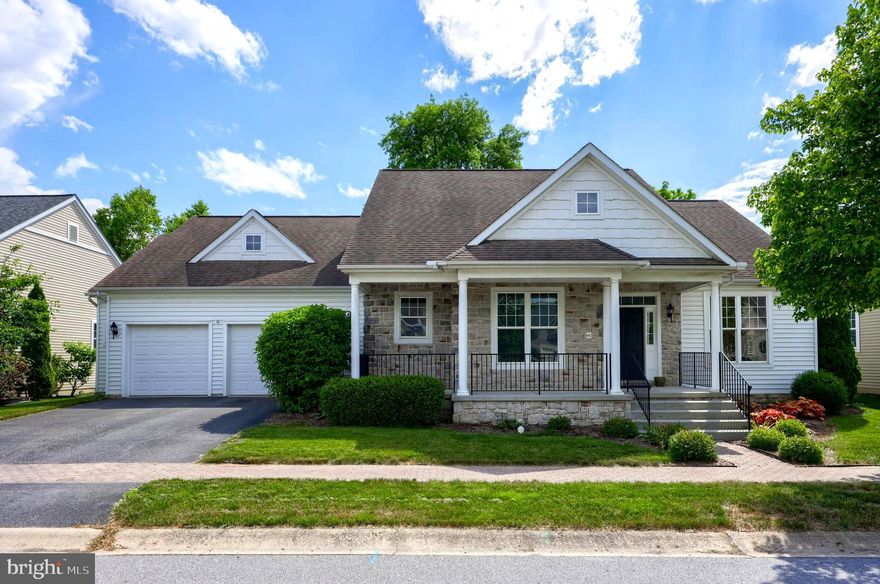 This gorgeous ranch home is situated on an outstanding lot in the ideally located Manheim Township Brighton neighborhood. Convenient to shopping, schools, restaurants, healthcare and all your needs. Walk or bike to Brighton Shoppes or enjoy the paths and trails great for active healthy living! This desirable  3 bedroom 2 bath open floor plan features wide open spaces, yards of hardwood floors, soaring ceilings, dramatic archways, and transom windows. Family and friends will love to congregate in the sunny vaulted great room open to the chef's kitchen with a breakfast/entertaining peninsula,  gas cooktop,  and current stylish cabinetry. Entertain in the oversized dining room perfect for every special occasion or use it for a flex room for sitting or study.  The primary bedroom is super spacious and has a luxurious primary ensuite bath and extra large walk in closet.  The 2 level over-sized deck offers you a natural gas hook up for your grill, built in serving bar, and overlooks the beautiful well landscaped tree lined premium backyard. The gigantic Superior Wall basement is extra tall and includes the handy egress of a Bilco door.  There is plenty of room for additional outdoor living on the spacious covered front porch - a perfect spot to relax on a  warm summer evening. You can feel the thoughtful planning that went into the vision and design of this beautiful easy living one floor home in the sought after location between the charming and award winning downtowns of both Lancaster and Lititz.