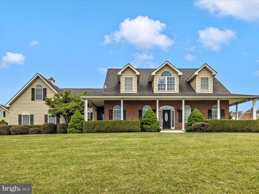 Custom built cape cod in desirable New Windsor!   This stunning property boasts a spacious interior with over 5,000 total square feet with basement and studio.    This lovely home features four bedrooms and  four bathrooms.   Primary suite is on the main level with luxurious ensuite!   Gorgeous curved staircase in two story entrance foyer.  The detached 30x50 garage also has a bedroom with full bath.   The huge oversized detached garage has plenty of storage for your RV, boat, race car or future business vehicles.   Garage is fully insulated with electric and  heat.  The heart of the home is the gourmet kitchen, equipped with high-end stainless-steel appliances, custom cabinetry, granite and a large island perfect for culinary creations.  There is also a back staircase in the kitchen!  The open floor plan seamlessly connects the living areas, ideal for entertaining or family gatherings.  Gorgeous curved staircase in two story entrance foyer.  Outside, the home is set on 1.27 acres of beautifully landscaped land, providing ample space for outdoor activities, gardening, or simply enjoying the breathtaking views. The home is zoned with two new HVAC systems.  Freshly painted and new carpeting throughout.  Conveniently located near local shops and great schools, the perfect blend of comfort, style, and convenience. Don't miss the chance to make this your dream home!   This amazing home won't last long! 
 Call Tammy Durbin for details.