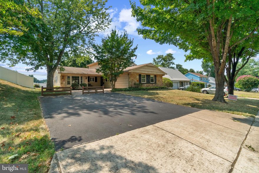 This charming and well-maintained 6 bedroom, 3 bathroom home offers space, convenience, and modern comfort for your family, all in the heart of Bowie.

The first level features a spacious living room, perfect for gatherings. A dedicated dining space allows for easy entertaining. Three bedrooms offer flexibility as guest rooms, home offices, or whatever your needs may be. One of these first-floor bedrooms boasts a luxurious en suite bathroom, creating a private primary suite.

The open kitchen is perfect for any cook, featuring ample counter space and seamlessly flowing out to a beautiful enclosed porch. Imagine enjoying meals overlooking the expansive backyard, which conveniently backs right up to Tulip Grove Elementary School for easy access to school grounds.

This home is the epitome of convenience. It's just blocks from the historic Belair Mansion and Stables. Minutes away, you'll find an abundance of shopping options, major transportation routes, and the Metro Park N Ride, making getting around a breeze.

Don't miss this opportunity to own a piece of the Bowie lifestyle!