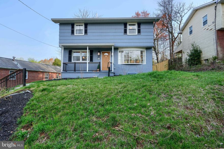 Lovely 5 bedroom 3.5 bath detached colonial with front porch and parking pad in the charming Idlewylde neighborhood. Hardwood flooring in the main level living room and dining room and the 4 upper level bedrooms. Ceramic tile flooring throughout the finished lower level, kitchen and bathrooms. Kitchen has white cabinetry, stainless steel appliances, gas stove, quartz countertops and backsplash. Living room has lighted tray ceiling. Lower level has rec room, 5th bedroom, laundry room and room for storage. Full baths in the primary bedroom, off the upper level hallway and on lower level. Plus half bath on main level. Large fenced backyard with patio. Convenient location. Must see!!!