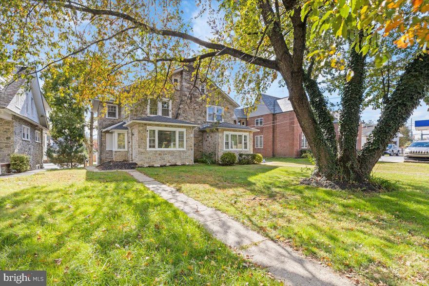 Tastefully renovated stone Victorian twin featuring 3 bedrooms, 1.5 baths, and three full floors of living space, plus a walkout basement and a rare detached garage. The gourmet kitchen has been beautifully updated with stainless steel appliances and modern finishes. A spacious laundry room opens to a covered porch overlooking the backyard, perfect for relaxing or entertaining. The family room offers plenty of natural light and a handsome fireplace, creating a warm and inviting atmosphere.

On the second floor, you’ll find the primary bedroom and a generous second bedroom, both serviced by a modern full bath. The third floor features two additional rooms, ideal as bedrooms, a home office, or creative spaces.

The full walkout basement extends the length of the home, providing ample storage or potential for additional living area.

The detached garage is a rare find—equipped with A/C, Wi-Fi, and an electric panel—making it a perfect workshop or studio for the handy homeowner. This home checks all of the boxes