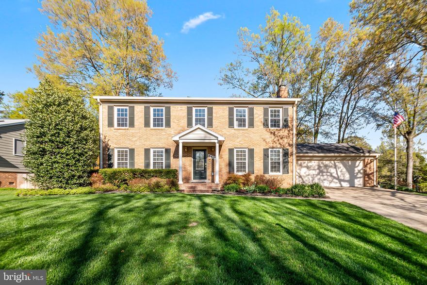 Set on a beautifully landscaped .29-acre lot in the sought-after Mount Vernon area, this classic brick center-hall colonial offers timeless curb appeal, generous living space, and the perfect setting for both everyday comfort and entertaining. Featuring 5 bedrooms, 2.5 baths, and approximately 2,352 square feet of finished space, the home blends traditional character with a functional floor plan designed for modern living. Hardwoods thru out and brand new LVT flooring in the kitchen and foyer.  Large kitchen with breakfast nook and large pantry.  Family room with fireplace and large living room with formal dining room off the kitchen.   Owners Suite has its own brand new bathroom and 1 bedroom has been converted into a spacious closet, for the primary suite, adding extra convenience and storage.. *****The large two-car garage includes windows and a rear door leading directly to the fenced yard and deck. A long driveway provides additional off-street parking, with plenty of room for vehicles and storage. *****Tucked away on a quiet cul-de-sac, this home offers both privacy and convenience, with quick access to the George Washington Parkway in just minutes. This is a rare opportunity to own an affordable home in one of Northern Virginia’s most attractive and established communities. *****
UPDATES: Sprinkler System (2010), Front porch and rear siding, Bilco door, gutters and all wood wrapped (2016), Roof (2016),  HVAC ( 2019), Water Heater (2020), (Microwave ( 2021), Garbage disposal (2021), 200AMP Main Panel Box with Whole Surge Protector (2023), Garage Door Opener (2024), Owners Suite Bathroom (2025), Washer and Dryer (2025), Luxury Vinyl Tile( 2026), New Hardware and Fixtures with Fresh Paint (2026). ***** OPEN HOUSE SATURDAY, APRIL 11TH, 12-2 PM***** Call local Friendly agent with questions!