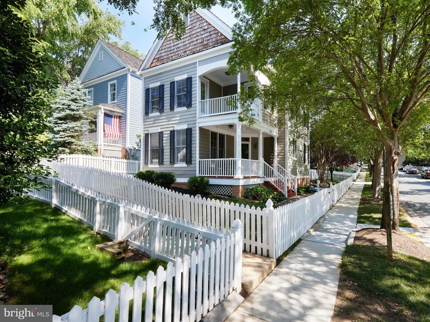 WOW!! MAJOR PRICE ADJUSTMENT! Look at this price for an EXCEPTIONAL VALUE FOR A SINGLE FAMILY HOME IN THE KENTLANDS HILL DISTRICT! -  Located on the picturesque Little Quarry  Road .  The front porch leads to a spacious main level featuring newly refinished hardwood floors, versatile living spaces and natural light filled rooms.   The table space kitchen offers a gas stove, upgraded counters, abundance of cabinets and access to the large deck.  The spacious family room features a fireplace.  Newly carpeted stairs lead to the second level.  The primary suite offers a cathedral ceiling, hardwood floors plus floor to ceiling windows and a spacious updated full bathroom with walk in shower and tub.   The second and third bedrooms also have hardwood floors and both have access to a private second level porch. The second level includes a full bathroom.   And the laundry is located on the second level. The lower level is partially finished with windows provide light.  Built-in bookshelves , recessed lighting and ceramic flooring enhance  this finished area.  Plus a large unfinished room for storage and a rough in for a future bathroom.      The deck leads to a parking space and a one car garage featuring electrical upgrade to 320 A (suitable for future EV use).  Freshly painted interior, newly painted picket fence and deck    - move-in ready.  All this plus a wonderful location in the Kentlands  neighborhood featuring shopping, dining and entertainment.