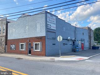 KEYSER – TWO STORY TOTAL DESIGNER BLOCK 6,700 SQ FT WAREHOUSE WITH HIGHT RENTAL INCOME. 33 INDOOR STORAGE UNITS AND A NEWLY CONSTRUCTED LARGE RESTAURANT RENTAL. FREIGHT ELEVATOR INCLUDED! RUBBER ROOF, CORNER LOT W HIGH VISIBILITY & PRIVATELY OWNED PARKING. ANNUAL INCOME RANGES FROM $32,000 TO $37,000. THE ONLY STORAGE FACILITY IN THE ENTIRE ARE WITH INDOOR UNITS. ONCE IN A LIFETIME OPPORTUNITY. RECENT IMPROVEMENTS: PAINTED EXTERIOR ($7,000), RESTAURANT REMODELED BY TENANT ($78,000). IMPROVEMENTS TO RESTAURANT BY LANDLORD $20,000 IN 2025. NEW PAINT: EXTERIOR AND INTERIOR OF BUILDING, NEW FLOORS & TRIM TO INTERIOR.