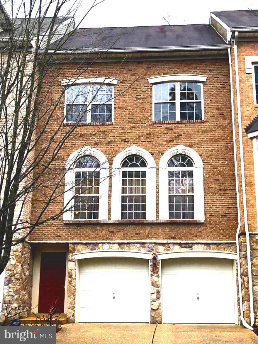 Luxury townhome for rent in a quiet boutique community. A great opportunity to lease this beautiful brick- fronted townhouse with almost 2500 sq. ft. of luxurious space spread over 3 levels! Naturally, brilliantly, daylight-illuminated home with spacious living room and formal dining room combo with gleaming hardwood floors. 9 ft. ceilings with recessed lighting and generous crown moldings on main level. A comfortable well-proportioned eat-in kitchen with breakfast nook and 42" maple cabinets, side by side refrigerator, double wall ovens and island cooktop. Beautiful rear deck, great for entertainment and relaxation. Gorgeous master bedroom suite with cathedral ceiling; luxurious bath equipped with shower and jacuzzi. Two additional bright and spacious bedrooms and a hall bath. New carpet. Large recreation room on lower level perfect for children. Newer dual zone heating and cooling. New front loading LG washer and dryer. 2 car garage + driveway provides adequate parking. Peaceful community park and play area in front of the house. Perfectly located: easy access to 270, 495, bus, metro, shopping, parks, recreation centers, 30 minute drive from DC.  Highly ranked public and private schools: Luxmanor/Tilden/Walter Johnson.
