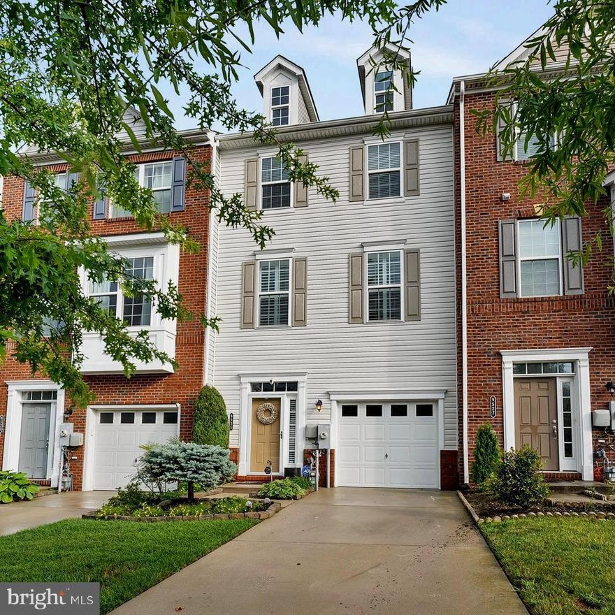 Open House Cancelled - Under Contract Welcome to this well-maintained townhome in Ballard Green! Spacious Open Concept Living.  Perfect for entertaining.  Beautiful hardwood flooring on main level and crown molding throughout.  Large living room with plantation blinds.  Gourmet kitchen with island,  stainless steal appliances, granite countertops, stone backsplash, peninsula with ample counter seating.  Large Dining room with sliding glass door walk-out to deck. Upper level is carpeted and has large primary suite with 2 closets and a primary bathroom with large shower and double vanity.  Good sized second bedroom.  The third bedroom can be used as an office. Full tub/shower bathroom in hall.  Laundry on upper level for convenience. Ground Entry from front door and garage.  Ground level has a large fourth bedroom or can be used as a family room. Sliding glass door to patio and yard with privacy fence. Powder room on ground entry level.  Pet friendly Community!  Make an appointment to see this home today!