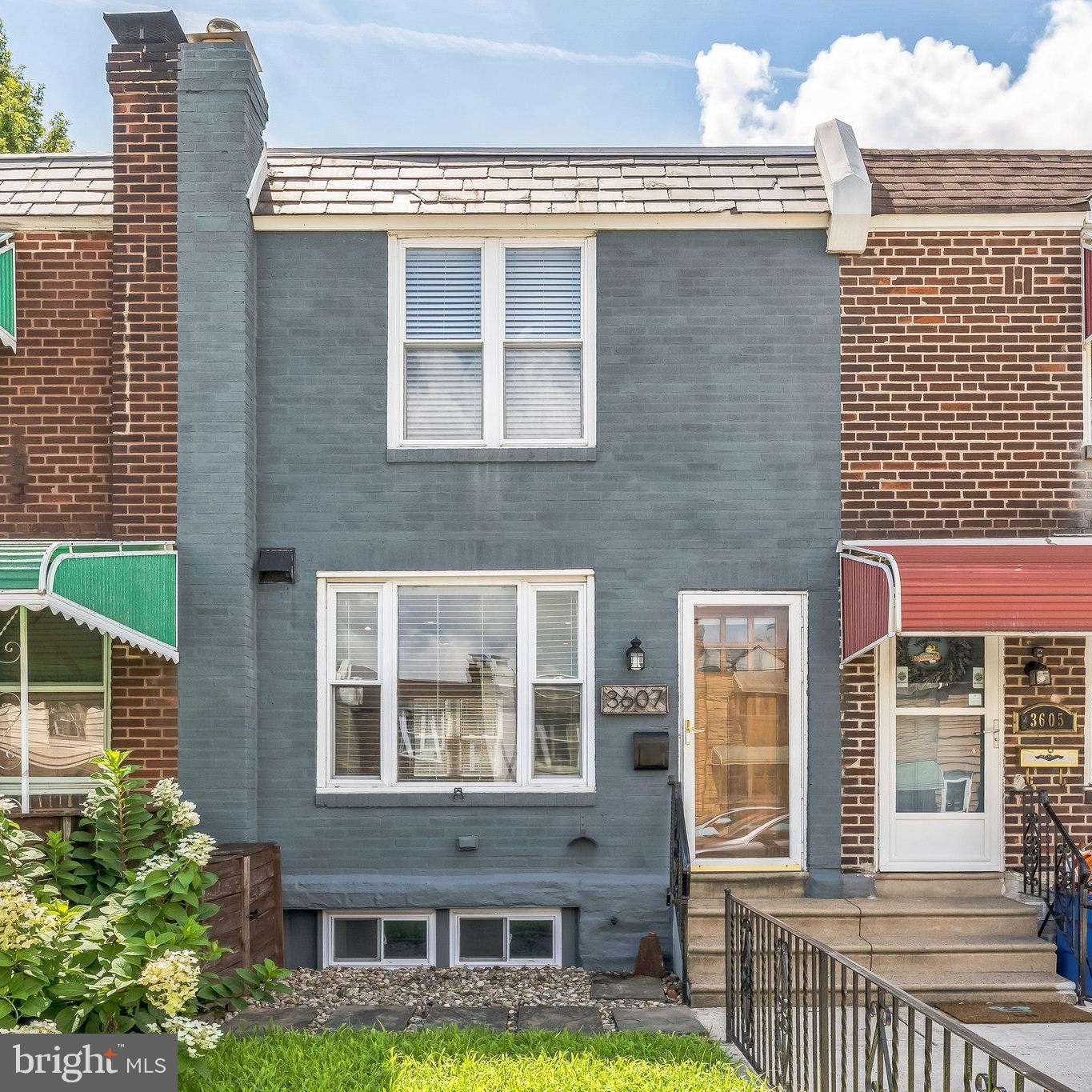 You will want to see this impeccably updated, move in ready home located on one of the most sought after streets in Port Richmond. The charming front yard leads you into a bright and open concept design. Right away you will notice beautiful wood working, gleaming hardwood floors, and an abundance of natural light. The stunning eat in kitchen features white shaker cabinets, stainless steel appliances, quartz countertops, porcelain subway tile, open shelving, large pantry, plus recessed and track lighting. The view is uninterrupted into the spacious living room, which has plenty of room for all of your furniture. High ceilings, exposed wooden beams, sconces and recessed lighting top off this room. The stairs leading you to the 2nd floor has a beautiful artistic railing. There are two good size bedrooms featuring shiplap, choice coloring, designer lighting, and refinished original solid wood doors. The Armoire in the main bedroom will stay with the home. The updated hall bathroom is classically finished with subway tile and a rainfall shower head. The finished basement offers plenty of storage along with a bonus room. Make it a game room, a family room or an office. You will also find a convenient half bathroom and the laundry room. Washer & dryer are included. Dryer is electric and ductless. Out back is a charming fenced in yard, offering you great privacy for all your activities. Gardening, grilling, relaxing by the fire pit and more. You will also find ample street parking. This home is convenient to highways, public transportation, restaurants, shopping, schools, coffee shops, and so much more. This is where you get to enjoy it all!