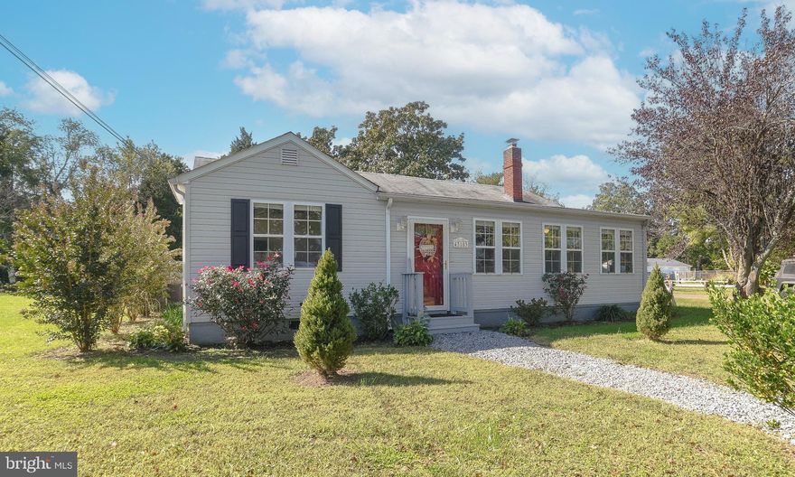 ***Seller offering a one point buydown.***  Please inquire for more details.

Hollywood Shores welcomes you home!!  This adorable one story rambler not only has water views but access to a community beach and boat ramp, within walking distance.
This well maintained home is bright, cheery and inviting.  Upon entering you will find a large foyer, the length of the home.  At the very end you will find a space that can be used as an artist's studio, kids play area or just storage.
The home opens up into the large family room with a large kitchen just behind.  Off to the left is a large laundry area with access to the backyard.  And, off to the right you will find a great dining space, with access to the rear entry driveway.
The two bedrooms on either side of the full bathroom complete this home.  Your forward facing bedroom has those sought after water views.  
And, to complete the home, you'll find a fully fenced backyard.

This gem won't last!  Book your showing today!