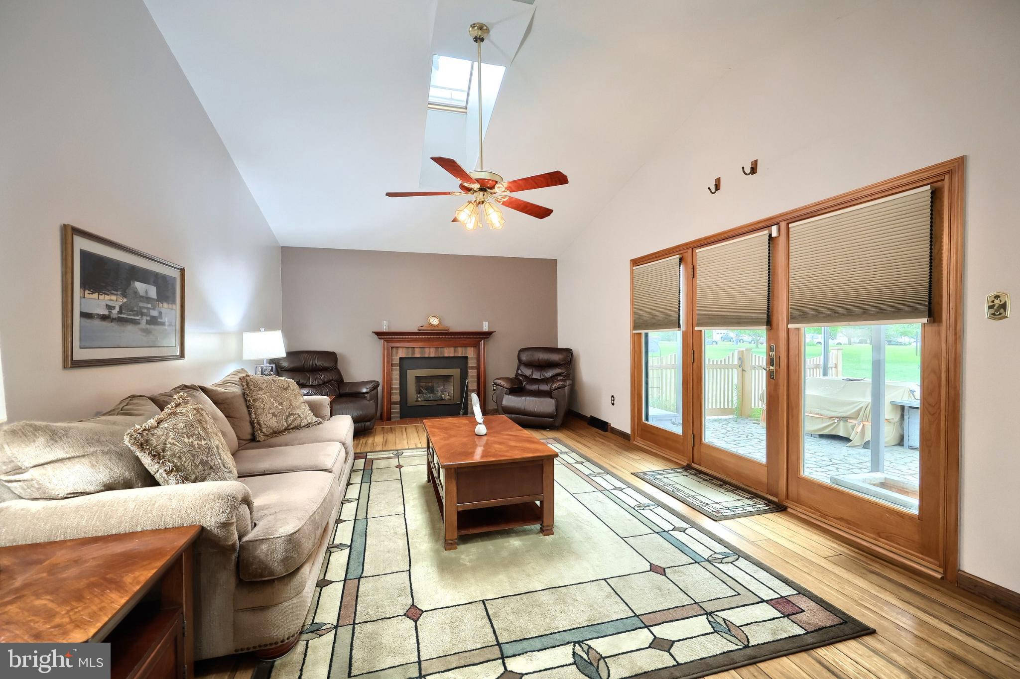 Tucked into one of York County’s most desirable neighborhoods, this stately Colonial will leave you speechless. From the moment you step inside, you're welcomed by natural light, and space that flows effortlessly from room to room. With over 2,000 square feet above grade, every detail of this home was designed for living large and living well.
The main living room steals the show with vaulted ceilings, twin skylights, and a gas fireplace framed by a timeless mantel. This is the kind of room that calls for slow Sunday mornings, holiday gatherings, or a quiet evening beside the fire. Just off the second living area, the kitchen opens to an inviting breakfast nook where morning coffee comes with a front-row seat to the beauty of the backyard. A gorgeously kept space where you can watch chipmunks, squirrels, birds and more enjoy a bite from the feeder just outside the bay windows.
A formal dining room offers the perfect space for hosting, while the oversized two-car garage and first-floor laundry provide day-to-day practicality without compromise. Upstairs, the owner's suite is everything you ever wanted, with a generously sized walk-in closet and a spa-like bath featuring a deep soaking tub and plenty of space to unwind after long days.
Downstairs, over 1,000 square feet of unfinished basement space with its own entry awaits your vision. Whether it's a home gym, game room, workshop, or even a future in-law suite, the potential is limitless.
Out back, life slows down. A custom stone paver patio stretches beneath a retractable awning and a charming gazebo. The perfect spot for evening dinners under the stars or lazy summer afternoons with a book and a breeze.
Set on a sizable lot in the Raintree community, you're just minutes from the Outdoor Country Club, York’s premier shopping and dining destinations, and the area’s top commuter routes. Neighborhood perks include a park with walking paths and playgrounds, a place where neighbors become friends and kids have room to roam.
This isn’t just a house. It’s lifestyle living, one that balances comfort, connection, and convenience in all the best ways.
