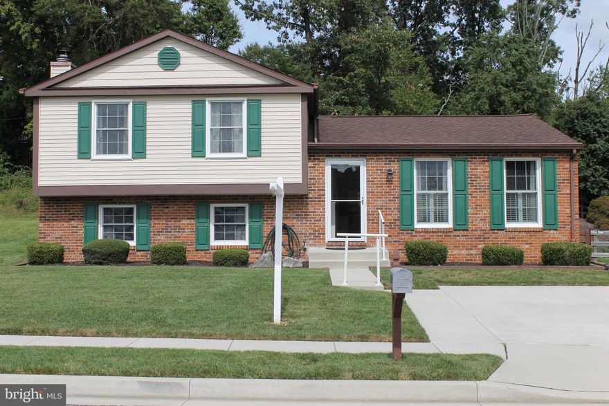 Well maintained 3 BR  2.5 BA single family home in the Upton Village Community.    This home has a large screened in rear porch with plenty of room for a table and chairs.  The porch is ready for your use for those crisp fall nights or gatherings.     Gleaming hardwood floors that were installed approx 4 years ago.  Neutral paint colors.  Eat in kitchen with partial open wall and plenty of natural light.   Separate dining area.  The primary bedroom has a extra  dressing area, large bay type window,  nice size closet, and primary bath.   The lower level features a family room for entertaining with stone gas fireplace and mantel. The lower level also has a beverage bar/counter and cabinets.   A half bath is on that level for your guests.    Separate laundry room that has front loading washer/dryer and additional storage area.   There is a 2nd basement storage room in back.  The front and rear yard are perfectly manicured and the back yard is fenced for privacy.   There is a beautiful stone wall in the back yard with an area above that is ready for your fall flowers.  Just behind the property are trees that create privacy.   Roof was installed approx 2010.  HVAC is 4 to 5 year old.   Double driveway and sidewalks are 2 years old.  Front door, storm door, and shutters were installed last year.   Basement counter and cabinet were installed one year ago.  Waterproofing was done prior.   New sump pump was installed in 2009.  Also, hose bibs are new.    What a great location.  This was actually the model home of the neighborhood!  Minutes to local shops, restaurants and the grocery store of your choice.    Local playground in the community.   Baltimore County public schools! **OPEN HOUSE SATURDAY  9/30/23  12:00PM-2:00PM**