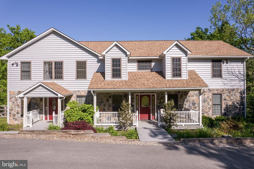 Beautiful and spacious estate on the Opequon Creek.  Impossible to choose this property's best feature, don't miss out on this jewel perfectly set in the panhandle of West Virginia. The perfect home for a family, with room to grow into. Spacious, private country living, hardwood floors throughout with 4 bedrooms and 3 full baths located on both floors and a gorgeous granite top kitchen with custom cabinetry.  No need for any home improvements as the roof  was replaced in 2019 as and the beautiful gray siding was replaced in 2020.   Upstairs HVAC was replaced May 2021.  Enjoy spectacular views with your coffee or meals overlooking the Opequon creek from the full back deck (perfect for entertaining) or your own private balcony off the primary and guest bedrooms on the second floor. Love the outdoors, or an avid bird watcher? Enjoy water access steps from your back deck, perfect for observing, fishing, kayaking, canoeing, or just relaxing with a good book.  Just a hour and a half hour from the DC area,  you get all the charm of small town life with easy access to DC, MD, and VA . Truly the best of both worlds! This property is currently being used as an Airbnb/Vrbo and is capable of bringing in over $100,000 per year in revenue and rents for $325/night.  Property is 1.78 acres.