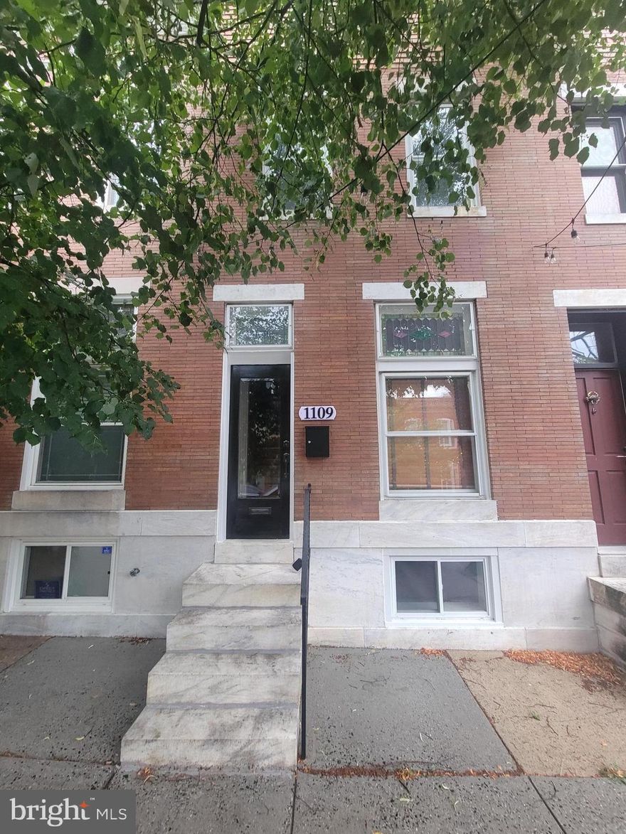 Brand new Renovation in Canton with a parking pad!!! Gourmet kitchen with stainless appliances, granite countertops and cherry cabinets. All new appliances. Exposed brick and beautiful wood floors on both levels. Berber carpet in basement. Porch off of bedroom. Walk in closet w/ skylight in bedroom. Stained glass windows in Living Room. Minutes from the water, Canton Crossing and Merritt Athletic.