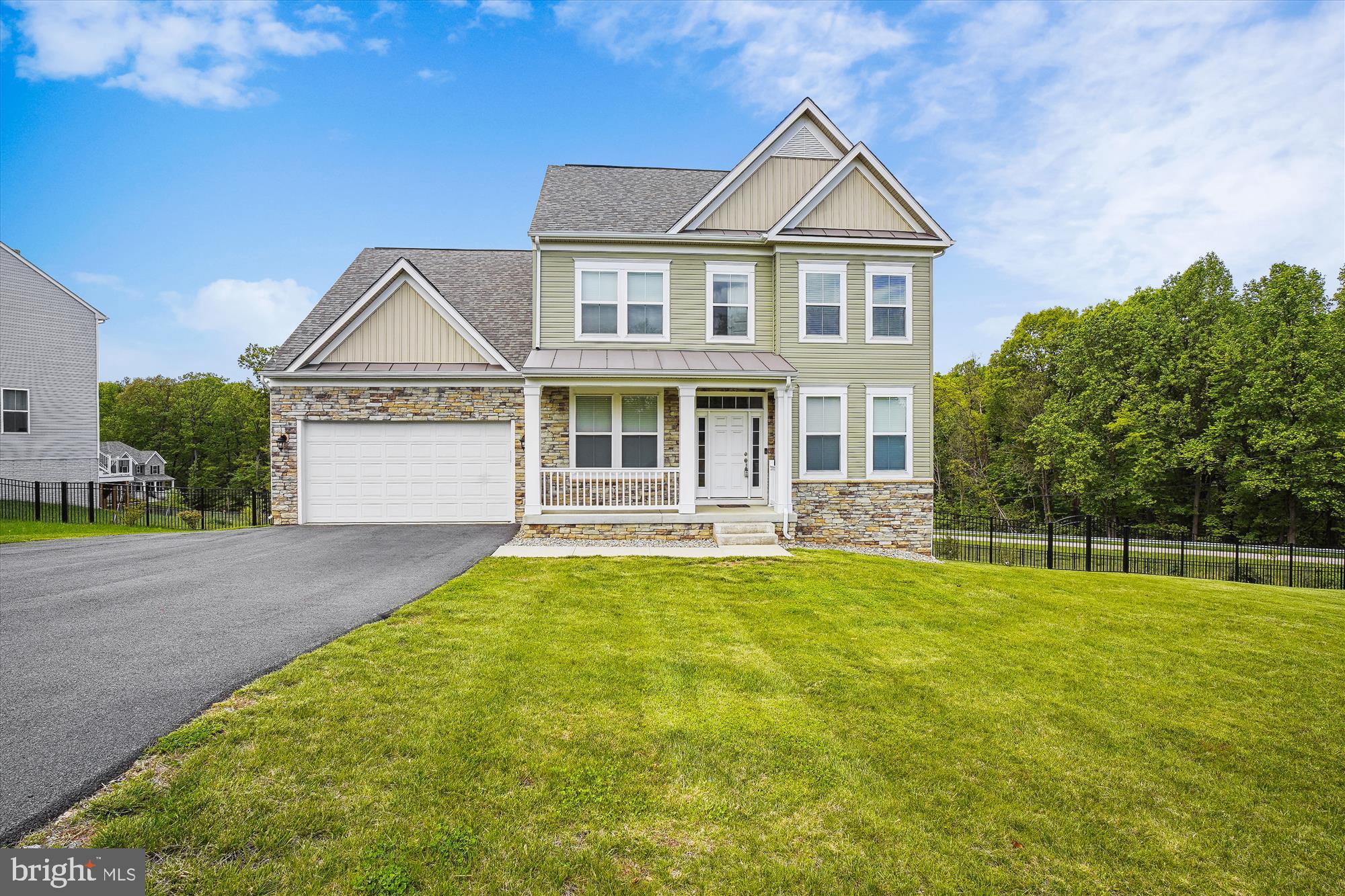 WELCOME HOME. THIS BEAUTIFUL LIKE-NEW HOME. FEATURES 4 BEDROOMS, 2.5 BATHROOMS, 2 CAR GARAGE, WOOD FIREPLACE, ON 3 LEVELS. HUGE DECK OVERLOOKING FENCED-IN BACKYARD. THE ARTISTIC DESIGN OF THE SHIPLAP WALLS, TO THE DRAMATIC OPEN CONCEPT DESIGN OF THE FIRST FLOOR LIVING LEVEL, STAINLESS STEEL APPLIANCES, THE KITCHEN ISLAND, GRANITE COUNTERTOPS, AND BEAUTIFUL CERAMIC TILES. CREATE YOUR RETREAT, GAME ROOM OR SPA IN THE LARGE LOWER LEVEL WITH FULL DAYLIGHT WINDOWS AND WALK OUT TO THE BACK YARD. HUGE FENCED-IN BACKYARD, VINYL DECK. PERFECT LOCATION FOR COMMUTING TO FREDERICK, D.C & VIRGINIA. CLOSE TO MAJOR ROUTES AND SHOPPING. NO HOA