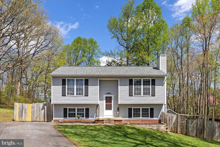 Located in the highly sought-after Riverbend School District, this recently remodeled four-bedroom, two-bath home offers comfortable living on a generous 0.86-acre lot at the end of a quiet cul-de-sac. You'll immediately appreciate the bright and inviting spaces, filled with natural light from the moment you step inside. The stylish kitchen is equipped with modern stainless steel appliances, sleek granite countertops, and plenty of space for cooking and casual gatherings. The spacious living room is perfect for relaxing and entertaining. The lower level offers additional living space complete with a cozy fireplace, perfect for chilly evenings. The two bathrooms in this home have been renovated with a spa-like feel. Outside, the expansive and flat yard presents endless opportunities for outdoor activities, gardening, or simply enjoying the peaceful surroundings. Come and see this wonderful home; it might be the perfect fit for you!