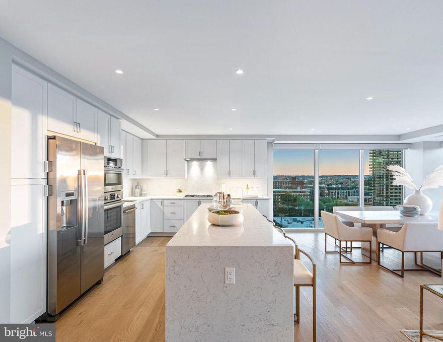 JUST STAGED and shows beautifully! This brand new 2BR/2BA/D is at Old Town's newest luxury condominium building, VENUE! Incredible value for the 11th floor; this unit offers 2200 sqft of living space and features walls of windows showcasing an abundance of natural light and expansive views of the city skyline, DC monuments, Potomac River, and National Harbor from every room! Built by renowned local developer, Carr Companies, the finishes in this building are extraordinary. Chef's kitchens feature Bosch appliance packages, Quartz countertops and custom cabinetry. This particular floor plan was designed to utilize every inch with purpose, so it lives larger than 2200 sq ft. The massive owner's suite with views of the DC monuments and Potomac River features a giant walk-in closet and an en-suite bathroom with a double vanity, water closet, and walk-in shower (with a 5 point shower head + detachable nozzle). VENUE offers a turn-key elevated lifestyle. Enter through the hotel-style Porte-Cochere into our Grand Lobby, where you will be met by our Full Service Concierge and on-site building manager to assist with your every need. The building features a sprawling Rooftop Terrace offering expansive panoramic views of the DC Monuments, Potomac River and Old Town skyline as well as an outdoor grilling station and fire pit seating area. The elegant indoor Owner's Sky-Lounge is equipped with flat screen TV's, fireplace and a cocktail bar, perfect for entertaining! Relieve your stress in the State-of-the-art Fitness center complete with a Barre studio. VENUE is the ideal location in Old Town's most desirable neighborhood, right in the center of entertainment, restaurants and shopping, with direct access to the Mount Vernon Trail. Come see what all the fuss is about! *Immediate Occupancy Available! *