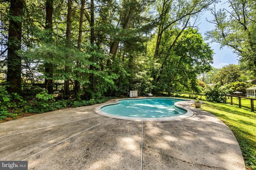 Estate Sale/AS IS   Stone Rancher on lovely partially wooded .56 acre lot with in ground pool. 49' deck off of Living Room, perfect for entertaining and enjoying mother nature.  Make this stone rancher your own space. House is in good condition, but needs updating to bring it to todays standards.  Primary Bedroom with full bath (shower stall).  Additional BRs have large double closets. Some fairly recent updates include roof (2016), Hot Water Heater (2023), W/D moved to main level in 2022, pool pump (2023), many windows have been replaced.  2 sided Stone Fireplace in LR (gas) and additional wood burning fireplace in the HUGE LL family room. Bonus room in LL could be bedroom/Office/playroom (roomy double closet). Large 2 car garage. In ground pool with ample decking to entertain family and friends.
Prof Photos Coming next week