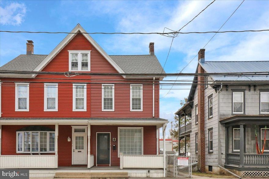 Move-in ready, charming, twin home in Pine Grove Borough!  This well-maintained home features a large eat-in kitchen with a newer stainless steel refrigerator and a convenient pantry.  You’ll love the new flooring in the spacious dining room and living room, highlighted by a huge custom window that fills the home with natural light. The welcoming front porch enhances the home’s curb appeal and charm.  Upstairs, two bedrooms with brand-new carpet, plus hardwood flooring in the 3rd (primary) bedroom. The updated bathroom includes a large linen closet for added storage and a brand new stylish shower with tub.  The sun porch offers a bright entry from the fenced-in lawn providing outdoor space to enjoy.  Plenty of Off-street parking adds convenience, as well as a 10x10 shed.  A basement with exterior access door for additional storage and functionality.  Major updates include a newer hot water heater, furnace, roof, and sump pump.    Move right in and make this wonderful home your own while enjoying Pine Grove's small town charm!