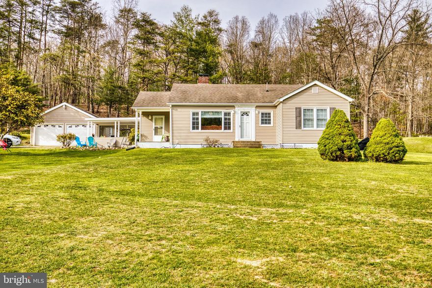 Peace and Relaxation! Come see this gorgeous property on 2.797 Acres with Detached Garage.  Home features 3 Bedrooms and 1 Full Bath with plenty of character including the arched entries in the Spacious Living Room & Dining Room, Cozy Kitchen with a window looking into the backyard, Laundry on Main Level, Unfinished basement with plenty of storage space, Beautiful Covered Patio area that's perfect for entertaining, plenty of parking and so much more!