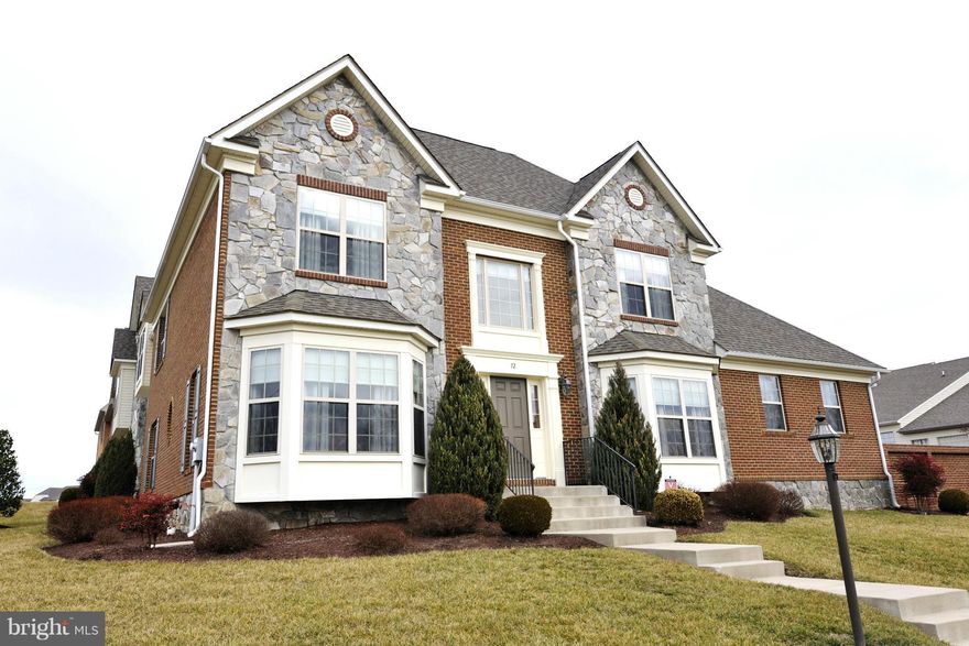 Beautiful home near golf course with historic Beallair as a club house!  Gated community, lawn service,  huge windows and tall ceilings, close to historic towns of Charles Town and Harpers Ferry, gourmet kitchen, 2 car garage,  quiet neighborhood.  Come and see this gorgeous home!  Running and walking trails.  This is an attached villa, but you would never know it!  Motivated Sellers!