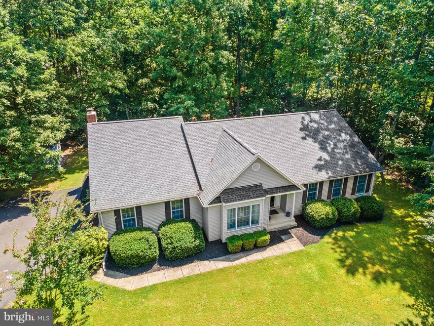 LOOKIN' GOOD IN THE NEIGHBORHOOD! New modified price! A great price!! Set in an ultra-convenient location, close to a full range of local amenities. Just about 15 min to Warrenton! Upon entering this home, immediate attention is drawn to the warm & relaxed feel. The home features hardwood flooring in the kitchen, dining, and foyer. The kitchen is open to the family room, The kitchen features quartz counters, back-splash, and gas cooking.  The floor plan encompasses a formal living space, dining space, family room, kitchen, primary bedroom/primary bathroom, and two secondary bedrooms. as well as a full secondary bathroom and a half bathroom for guests! Enjoy barbecues on your deck overlooking the private backyard! HVAC-2017.  Roof 2017. Two hot water heaters, one electric and another gas tankless water heater. 2nd HWH is for the washer. Welcome Home! Comcast internet!