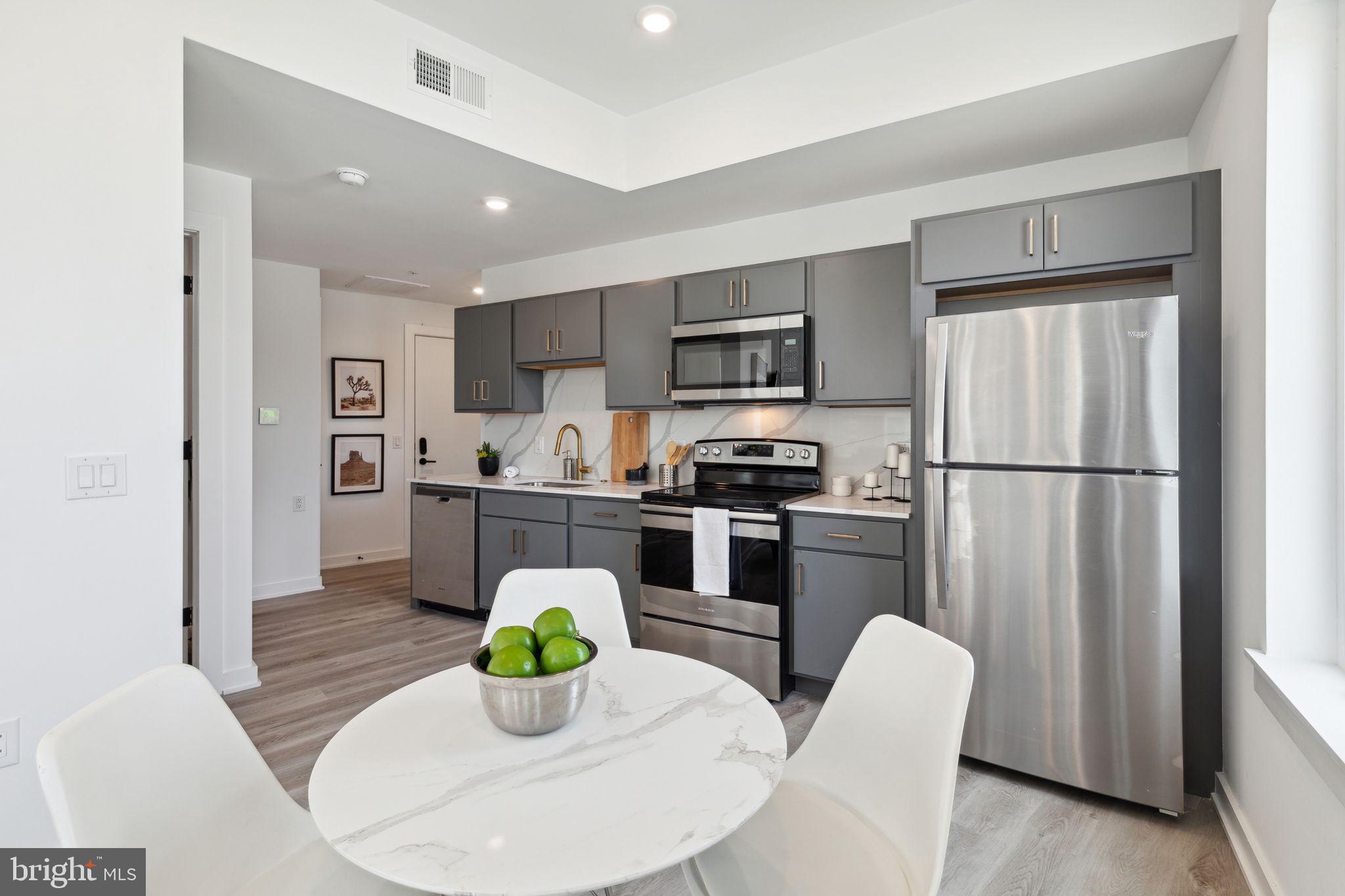 Available NOW | LEASING SPECIALS: $250 visa gift card if you apply within 24 hours of your showing AND only 1st month's rent and security deposit due upfront prior to move-in! 1 month FREE on a 13-month lease: $1,450/month gross rent, $1,338/month net effective rent. | A physical tour is required before applying. Sight unseen applications will not be considered.
Welcome to Penn Reading! This gorgeous, professionally managed building is the perfect place for you to call home! Modern features collide with convenient living in these spacious 1 and 2 bedroom apartments, located in vibrant East Kensington. You’re sure to love the luxurious lobby showcasing an elevator and 2 separate stairwells for easy and secure access in and out of the building. An Amazon Digital Key Delivery Access ensures your packages will be delivered inside the building for added peace of mind. Conveniently equipped with central a/c for year-round comfort and in-unit laundry, each unit was custom engineered to offer peace of mind and well-being. The open floor plans provide a bright and airy atmosphere and ample room for you to customize your furniture arrangement. Enjoy kitchens that have never been used before and are fully equipped with cabinetry above and below, marble counters and backsplash, and sleek stainless steel appliances. Large windows offer abundant sunlight throughout and the bedrooms are sizable with sliding closet doors. The elegant bathrooms boast modern fixtures and lighted vanities with storage space. Unit #4B is a 1 bedroom, 1 bathroom apartment on the fourth floor with giant windows, private balcony, and a large common area. This beautiful rental won’t last long – call today to claim this gem as your own!
Lease Terms:
Generally, 1st month, 12th month, and 1 month security deposit due at, or prior to, lease signing. Other terms may be required by Landlord. $55 application fee per applicant. Pets are conditional on owner's approval and may require an additional fee, if accepted. (Generally, $500/dog and $250/cat). Tenants responsible for: electricity, cable/internet, and flat water fee ($40/month for 1bed). Landlord Requirements: Applicants to make 3x the monthly rent in verifiable net income, credit history to be considered (i.e. no active collections), no evictions within the past 4 years, and must have a verifiable rental history with on-time rental payments. Exceptions to this criteria may exist under the law and will be considered. Leasing specials are for new residents only. $250 visa gift card if you apply within 24 hours of your showing. The gift card will be issued after the lease start date.